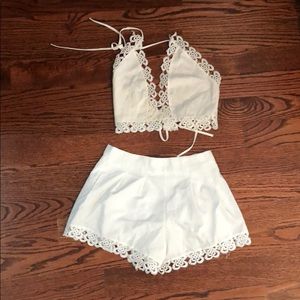Two piece white lace short and halter set